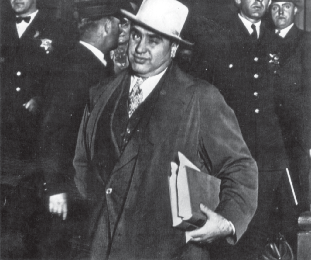 “Al Capone winking at the camera. Courtesy of V. Inserra and the FBI.”