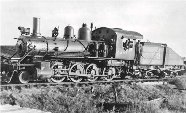 A black and white photo of a train