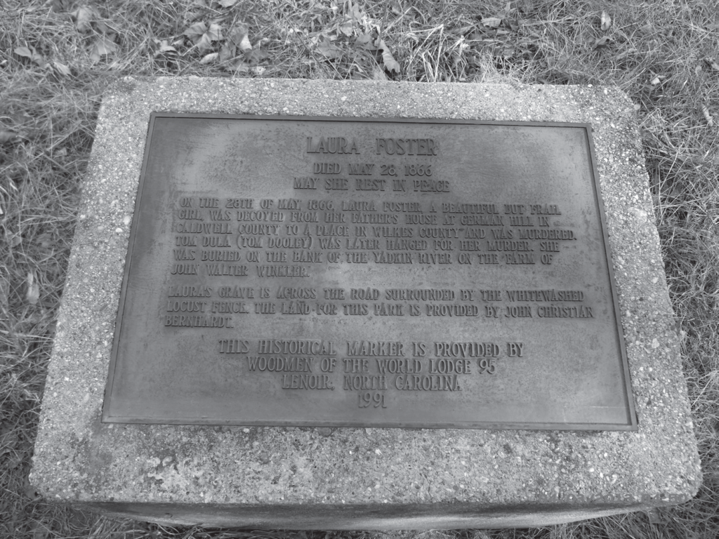 “A roadside plaque about Laura Foster on the west side of Highway 268 across from the Laura Foster grave site in Caldwell County. The grave site is on private property and is not accessible to the public. Author’s collection.”